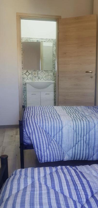 Camera Doppia con Letti Singoli con Bagno Privato